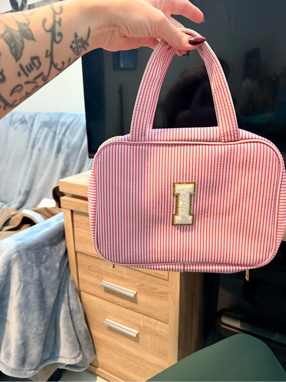 Pink Striped Handheld Cosmetic Bag with Gold 'I' Accent
